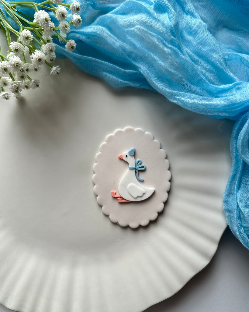 L'Oie Câline & Son Nœud